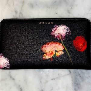 Black wallet with flowers